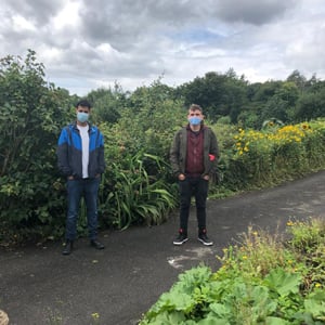 Aron and Steve outside wearing masks